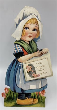 5 5/8” tall 1922 Embossed Dutch Girl Easel Back Antique Calendar
