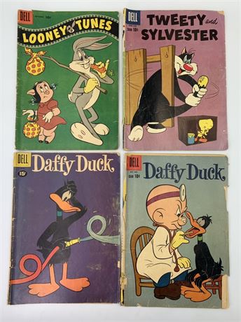 10 cent to 15 cent 4 pc Comic Lot:Daffy, Tweety & Sylvester, Looney Tunes